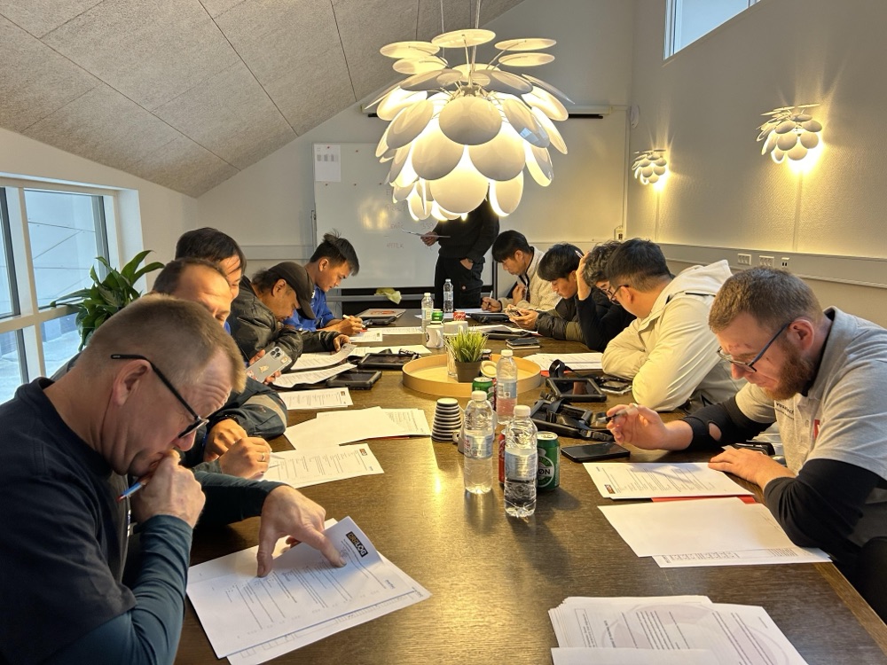 Technicians during a written assessment at CRALOG Academy